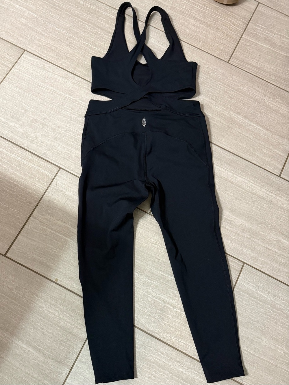 NWOT Free People back it up onesie in black